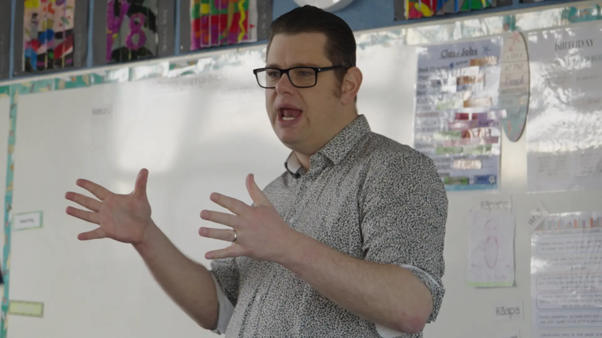 A tutor speaking with his hands during a lesson at the 2024 Intensive