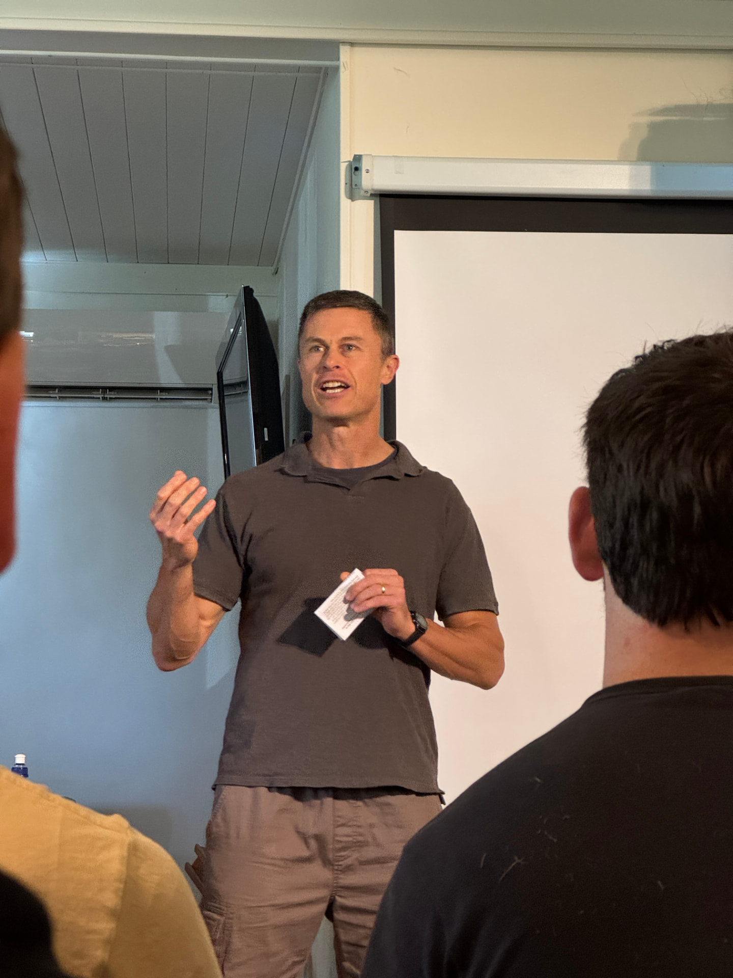 A speaker addressing the young men during a Liberate session